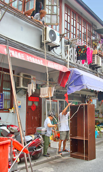 How to get a cupboard to an upstairs room in Shanghai