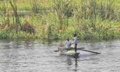 Nile River bank near Aswan, fishing boat