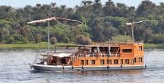 Nile River traffic near Aswan, Egypt - large felucca