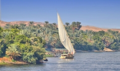 Nile River traffic near Aswan, Egypt - small felucca