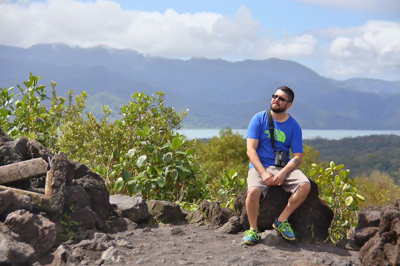 On the Lava slopes of Mt Arenal, Lake Arenal in the background