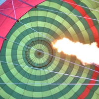 Looking up at the flame in a soaring Hot Air Balloon