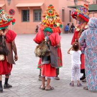 Ex Water Carriers pose for tourist photos