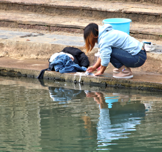 Country village with adjacent "allotments" and river near Yangshuo, China