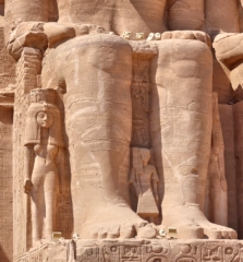 Temple of Ramesses II at Abu Simbel - smaller figures of his wife Nefetari and children can be seen at his feet.
