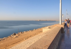 Standing on the Aswan High Dam wall, on the left (upstream) is the 500 km reservoir called Nasser Lake, created by the dam.
